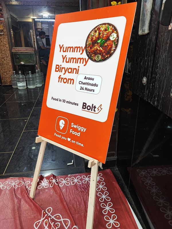 Yummy Yummy Biryani Arasu Chettinadu easel board outside restaurant