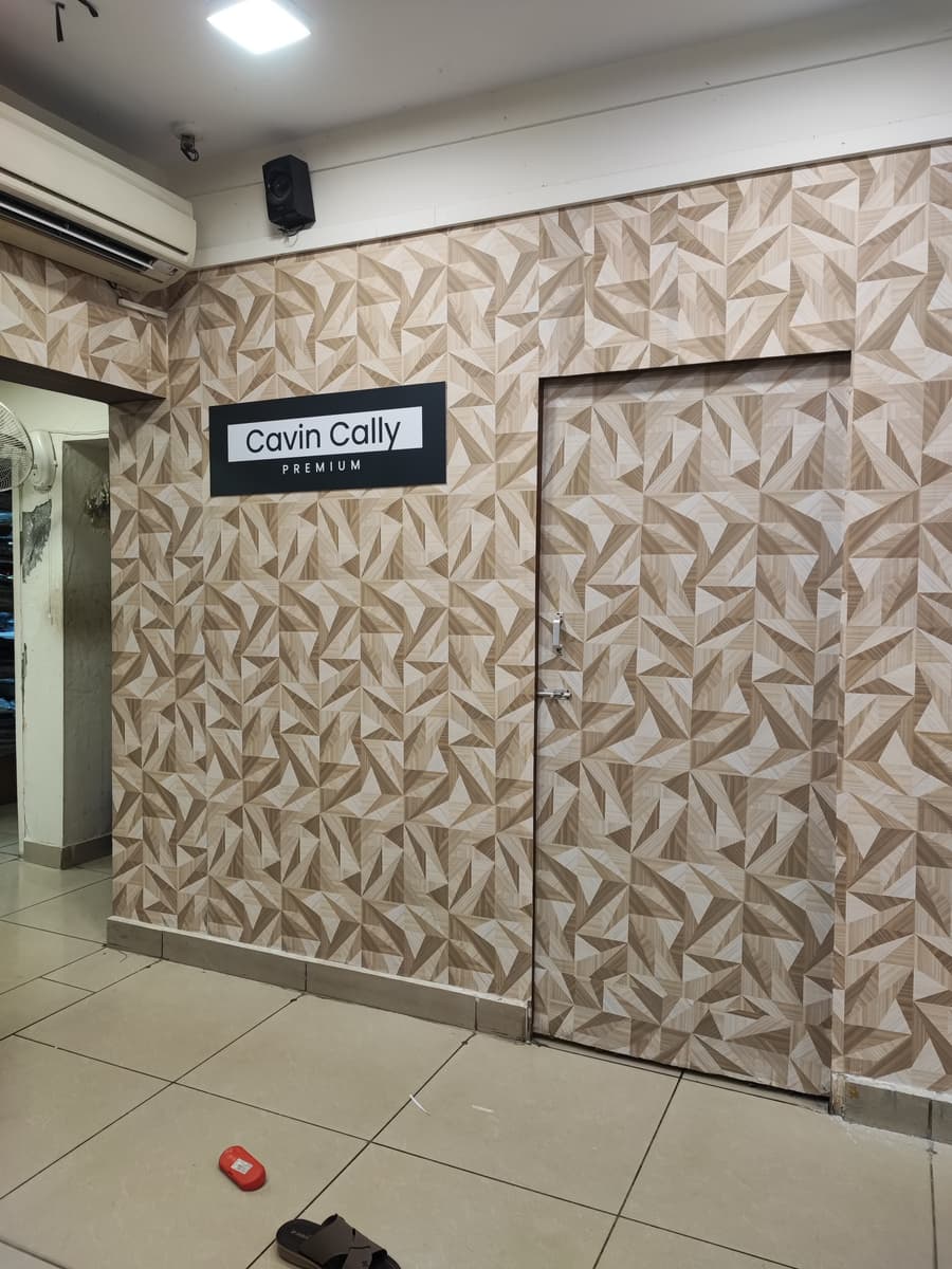 Cavin Cally premium showroom wall with geometric wood-pattern wallpaper