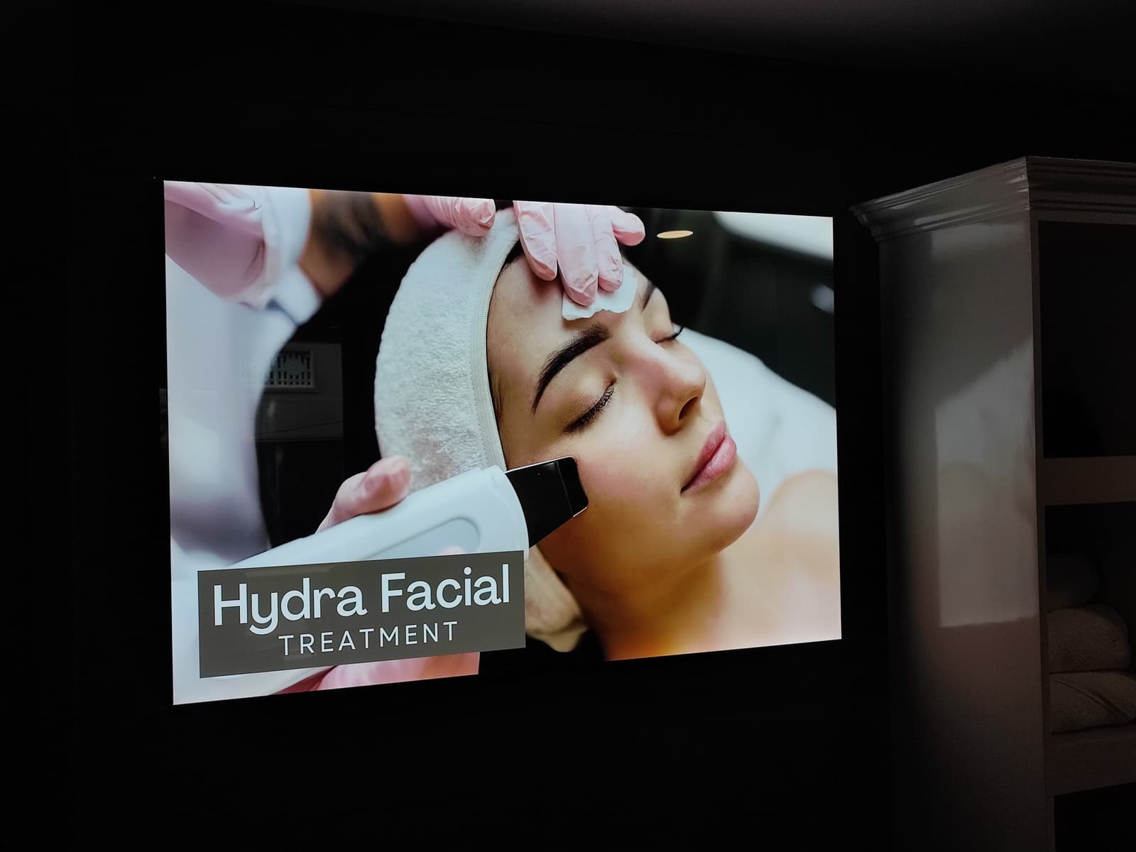 Hydra Facial Treatment LED display panel in a salon
