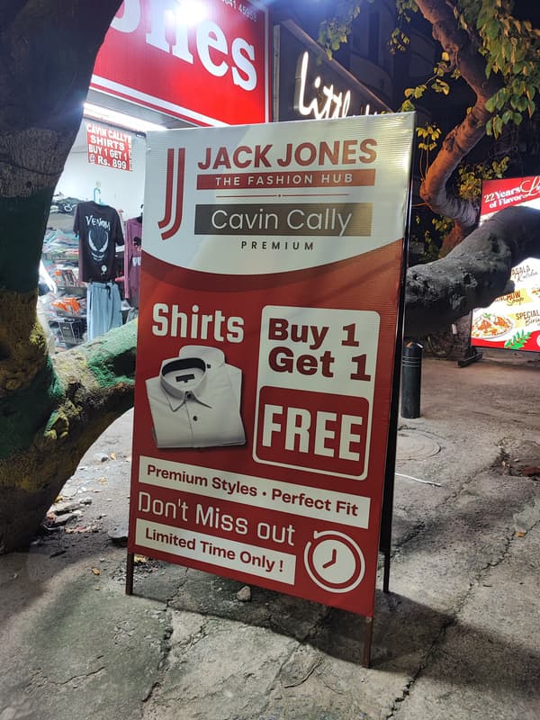 Jack Jones and Cavin Cally Buy 1 Get 1 roll-up standee outside store