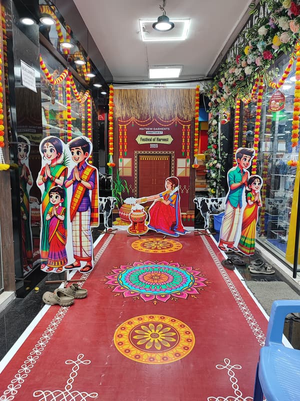 Mathew Garments festival of harvest decor with cutouts and rangoli