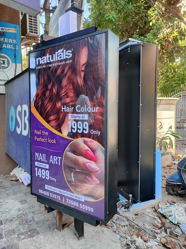 Naturals 360 degree rotary standee with hair colour and nail art ads